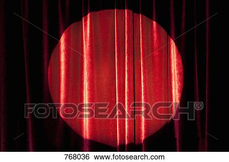 A spot lit red stage curtain View Large Photo Image Stock Photograph - A spot lit red stage curtain. Fotosearch