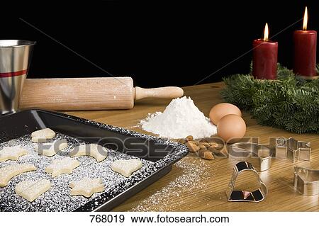 Baking cookies at Christmas View Large Photo Image Stock Photo - Baking cookies at Christmas. Fotosearch