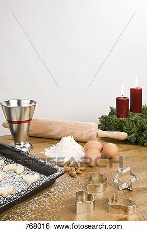Baking cookies at Christmas View Large Photo Image Stock Photograph - Baking cookies at Christmas. Fotosearch