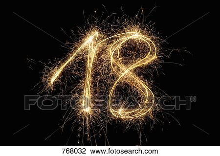 The number 18 written with a sparkler View Large Photo Image Stock Image - The number 18 written with a sparkler. Fotosearch