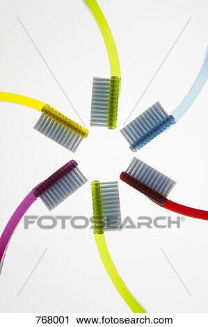 Stock Image - Toothbrushes in a circle. Fotosearch
