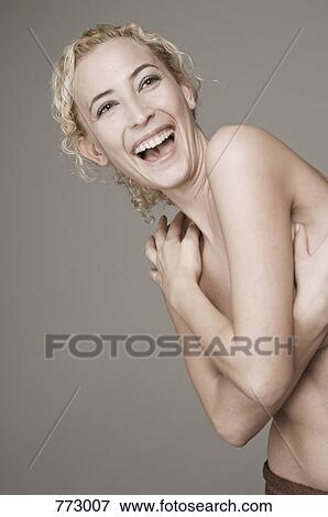 A semi-dressed woman laughing in surprise, portrait View Large Photo Image Stock Photo - A semi-dressed woman laughing in surprise, portrait. Fotosearch