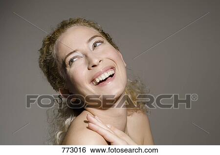 A semi-dressed woman laughing, portrait View Large Photo Image Stock Photograph - A semi-dressed woman laughing, portrait. Fotosearch