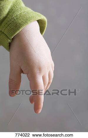 A baby's hand View Large Photo Image Stock Image - A baby's hand. Fotosearch