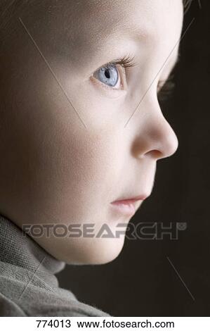 Portrait of a young boy View Large Photo Image Stock Image - Portrait of a young boy. Fotosearch