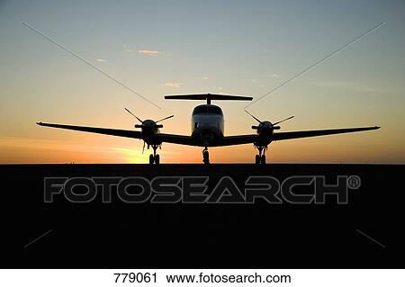 Stock Image - An airplane on the runway. Fotosearch