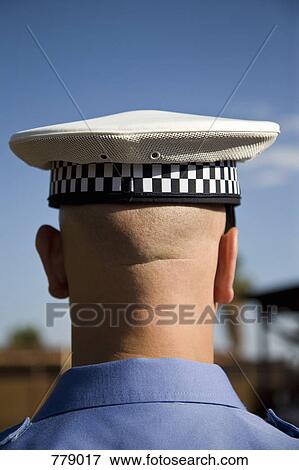 Rear view of a policeman View Large Photo Image Stock Photo - Rear view of a policeman. Fotosearch