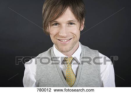 Studio portrait of a businessman View Large Photo Image Stock Image - Studio portrait of a businessman. Fotosearch