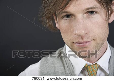 Studio portrait of a businessman View Large Photo Image Stock Image - Studio portrait of a businessman. Fotosearch