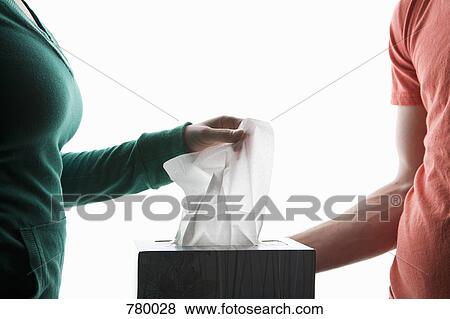 Two people with a box of tissues, midsection View Large Photo Image Stock Photo - Two people with a box of tissues, midsection. Fotosearch