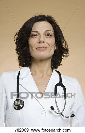 A female healthcare worker View Large Photo Image Stock Photo - A female healthcare worker. Fotosearch