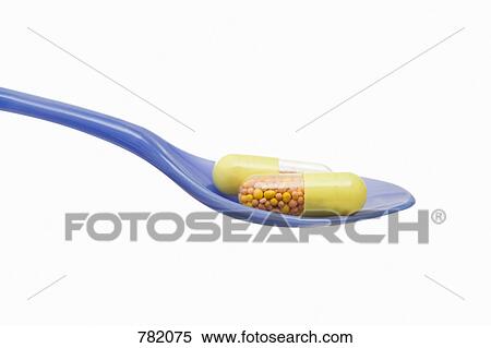 A spoon with two medicine capsules View Large Photo Image Stock Photography - A spoon with two medicine capsules. Fotosearch