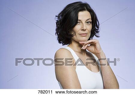 Portrait of a woman with mid length brown hair View Large Photo Image Stock Image - Portrait of a woman with mid length brown hair. Fotosearch