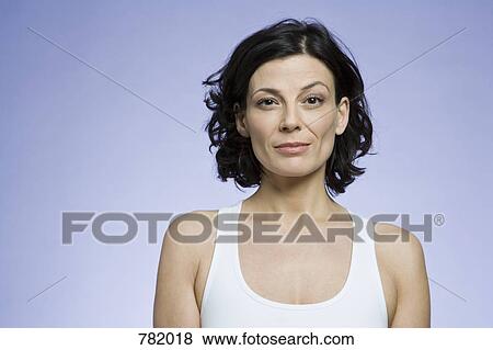 Portrait of a woman with mid length brown hair View Large Photo Image Stock Photo - Portrait of a woman with mid length brown hair. Fotosearch