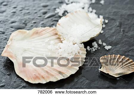 Stock Photograph - Three shells and bath salts. Fotosearch