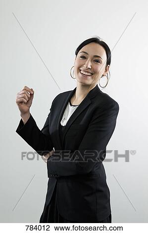 A businesswoman laughing, portrait View Large Photo Image Stock Image - A businesswoman laughing, portrait. Fotosearch