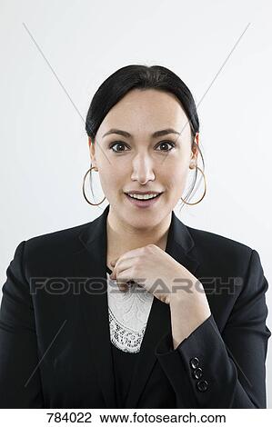 Stock Image - A businesswoman with a surprised facial expression, portrait. Fotosearch