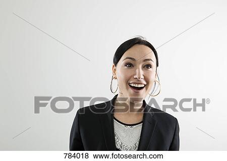 A businesswoman with a surprised facial expression, portrait View Large Photo Image Stock Photo - A businesswoman with a surprised facial expression, portrait. Fotosearch