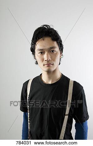 A man looking away, portrait View Large Photo Image Stock Image - A man looking away, portrait. Fotosearch
