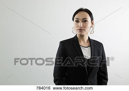 A serious businesswoman, portrait View Large Photo Image Stock Photograph - A serious businesswoman, portrait. Fotosearch
