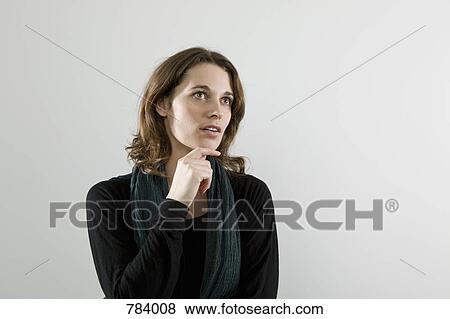 A woman thinking, portrait View Large Photo Image Stock Photo - A woman thinking, portrait. Fotosearch