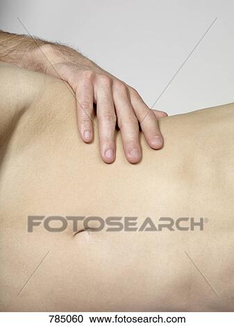 Detail of a man touching a woman's hip View Large Photo Image Stock Image - Detail of a man touching a woman's hip. Fotosearch