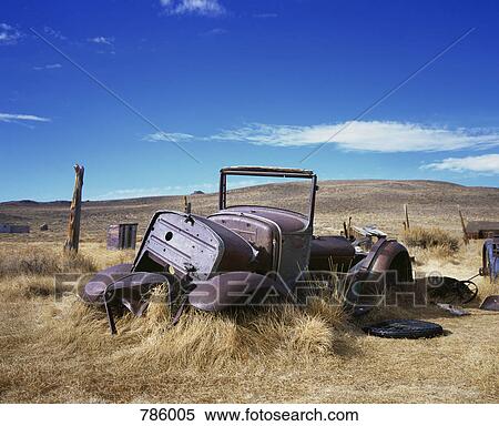 An old abandoned car in a field, Bodie State Historic Park, California, USA View Large Photo Image Stock Photography - An old abandoned car in a field, Bodie State Historic Park, California, USA. Fotosearch