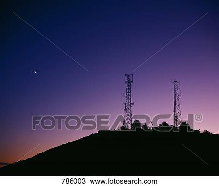 Transmission towers at dusk View Large Photo Image Stock Image - Transmission towers at dusk. Fotosearch