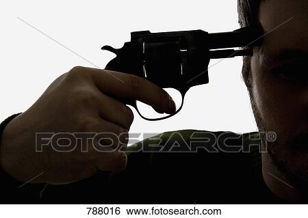 Detail of a man holding a gun to his head View Large Photo Image Stock Photograph - Detail of a man holding a gun to his head. Fotosearch
