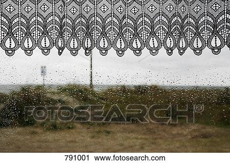 Rain drops on a window View Large Photo Image Stock Image - Rain drops on a window. Fotosearch