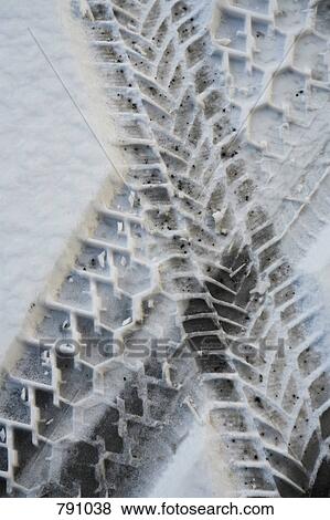 Tire tracks in snow View Large Photo Image Stock Photo - Tire tracks in snow. Fotosearch