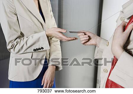 A woman paying by credit card View Large Photo Image Stock Photo - A woman paying by credit card. Fotosearch