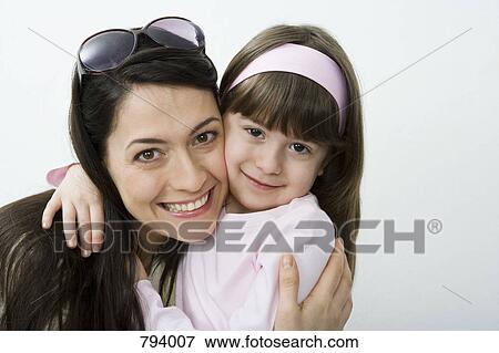 A woman and her daughter, portrait View Large Photo Image Stock Photo - A woman and her daughter, portrait. Fotosearch