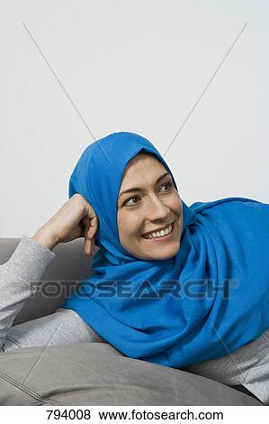 Portrait of a woman wearing a Hijab View Large Photo Image Stock Photo - Portrait of a woman wearing a Hijab. Fotosearch