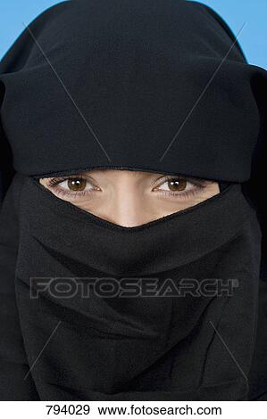 Portrait of a woman wearing a Niqaab View Large Photo Image Stock Photo - Portrait of a woman wearing a Niqaab. Fotosearch