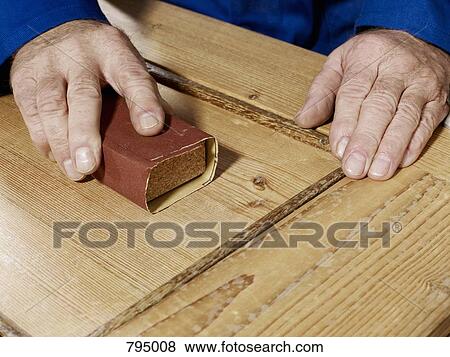 Detail of a man sanding wood View Large Photo Image Stock Photo - Detail of a man sanding wood. Fotosearch