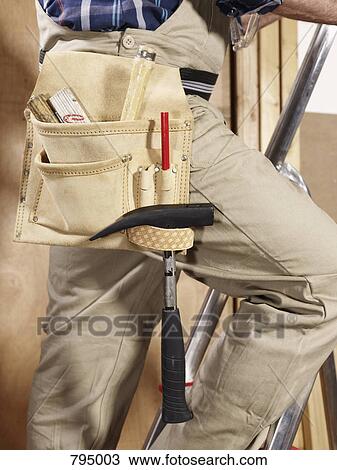 Midsection of a manual worker View Large Photo Image Stock Image - Midsection of a manual worker. Fotosearch