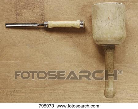 Wooden mallet and chisel on a workbench View Large Photo Image Stock Image - Wooden mallet and chisel on a workbench. Fotosearch