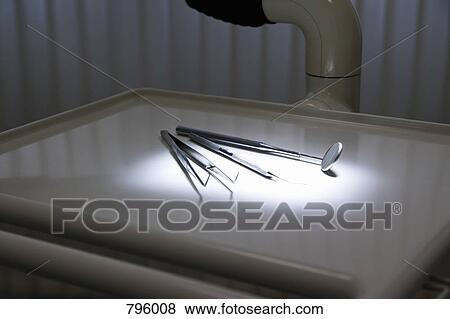 Dental instruments on a tray View Large Photo Image Stock Photo - Dental instruments on a tray . Fotosearch