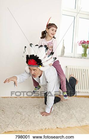 A grandfather and granddaughter playing make believe View Large Photo Image Stock Image - A grandfather and granddaughter playing make believe. Fotosearch