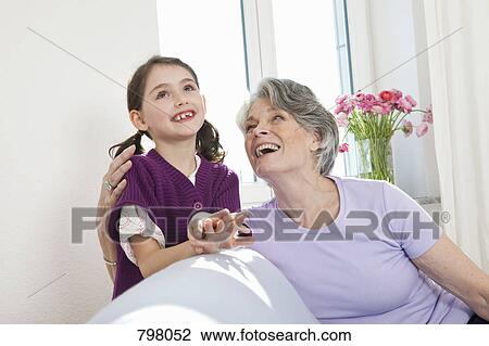 A grandmother and granddaughter spending time together View Large Photo Image Stock Image - A grandmother and granddaughter spending time together. Fotosearch