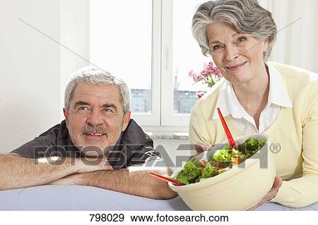 A senior couple before eating salad View Large Photo Image Stock Photo - A senior couple before eating salad. Fotosearch