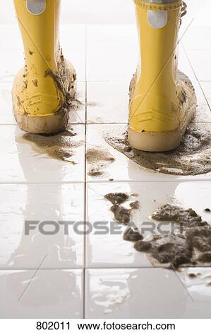 A pair of muddy rubber boots View Large Photo Image Stock Image - A pair of muddy rubber boots. Fotosearch
