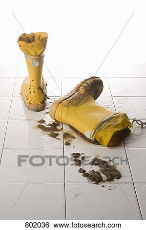 A pair of muddy rubber boots View Large Photo Image Stock Photograph - A pair of muddy rubber boots. Fotosearch