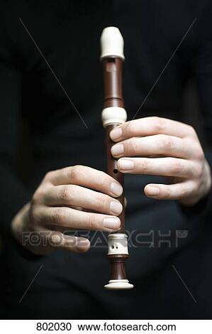 Human hands playing a recorder View Large Photo Image Stock Image - Human hands playing a recorder. Fotosearch