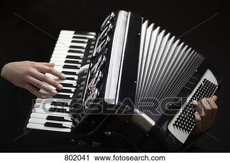 Human hands playing an accordion View Large Photo Image Stock Image - Human hands playing an accordion. Fotosearch