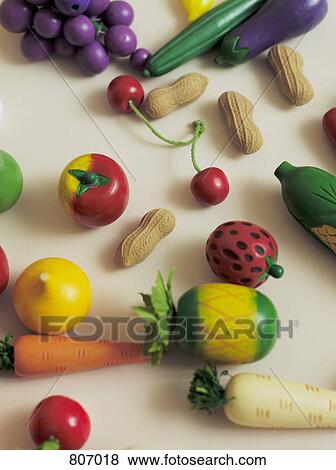 Arrangement of toy fruits and vegetables View Large Photo Image Stock Photo - Arrangement of toy fruits and vegetables. Fotosearch