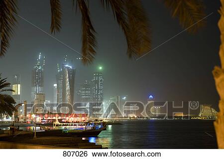 Harbor and cityscape at night, Doha, Qatar View Large Photo Image Stock Photograph - Harbor and cityscape at night, Doha, Qatar. Fotosearch