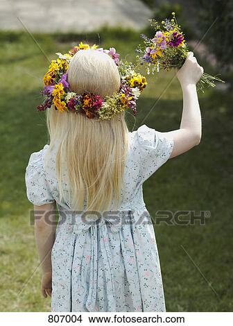 Rear view of a flower girl View Large Photo Image Picture - Rear view of a flower girl. Fotosearch