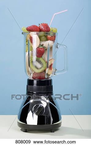 A blender full of fruits with a drinking straw View Large Photo Image Stock Photo - A blender full of fruits with a drinking straw. Fotosearch